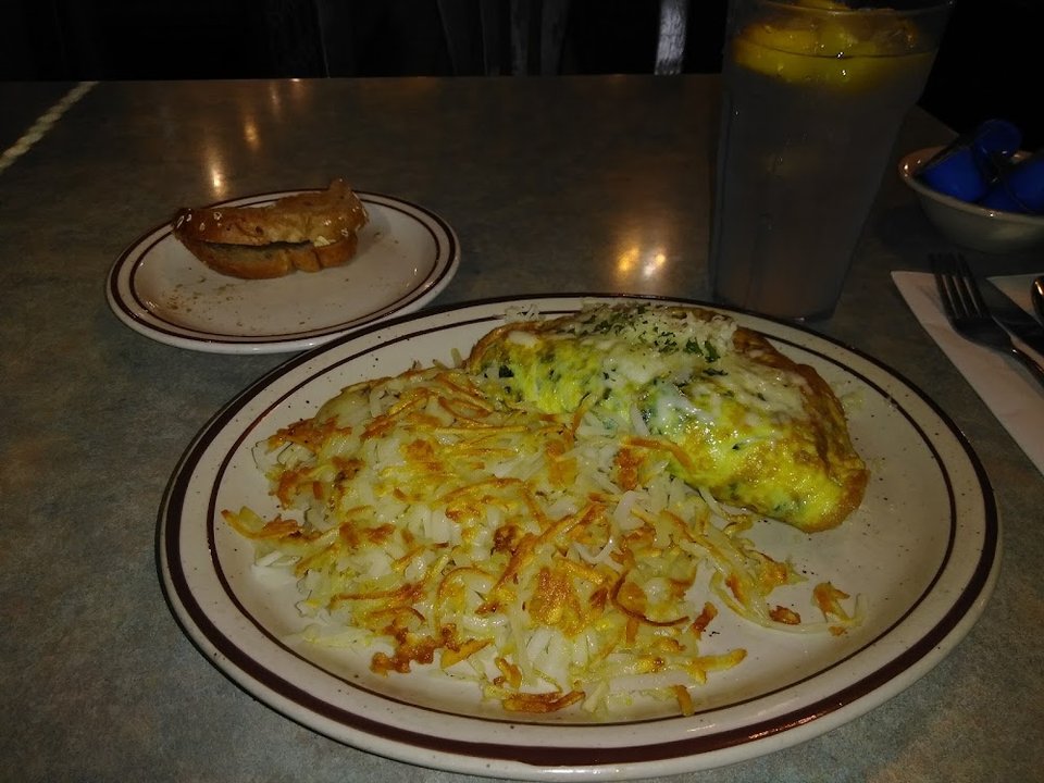 Dessert and breakfast items on a diner menu.
