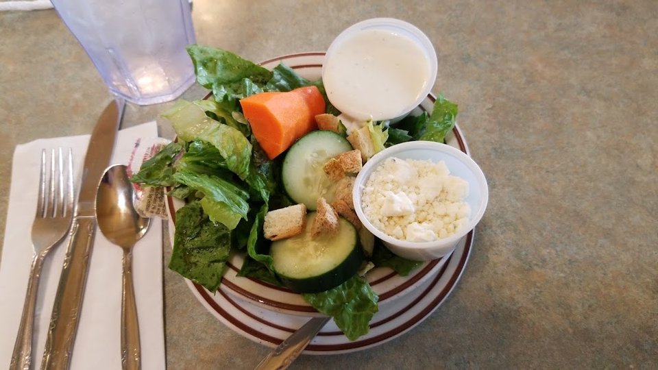 Printed menu with breakfast and lunch sections.