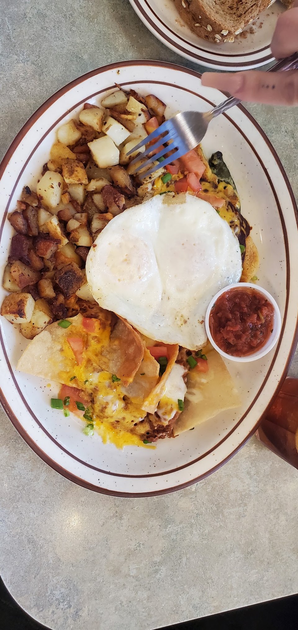 Printed menu with breakfast and lunch sections.